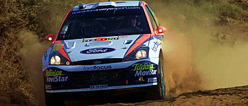Colin McRae fordert Michael Schumacher heraus!