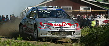 Peugeot-Doppelsieg durch Grönholm und Burns – Schwarz 13.