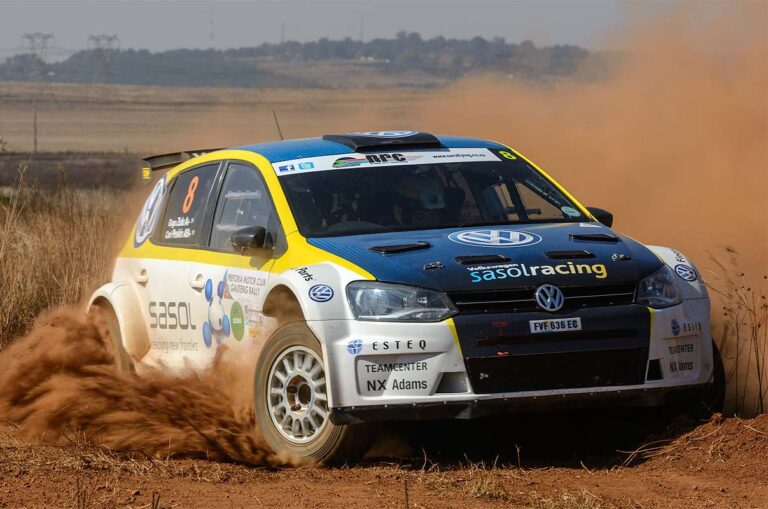 Meister Cronje vor zwei Volkswagen